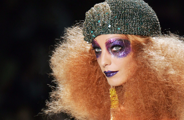 Sparkly purple makeup.